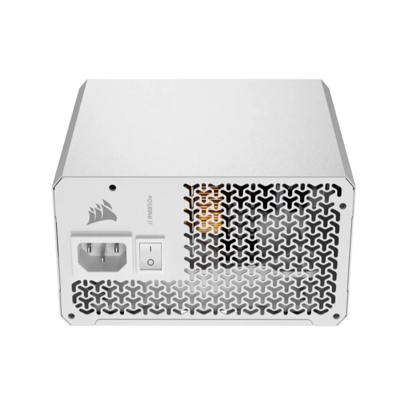 An angled shot of the white Corsair RM850e focusing on the AC input and switch.