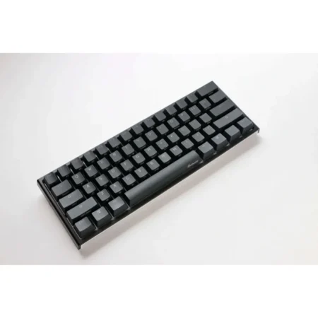 Hero shot of the Ducky One 2 Pro Mini Cherry MX Blue taken from the left, showcasing its slim black chassis profile.
