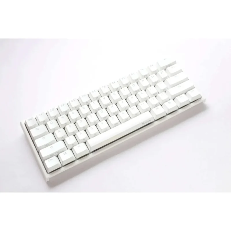 Hero shot of the Ducky One 2 Pro Mini White Cherry MX Black taken from the left, showcasing its slim white chassis profile.