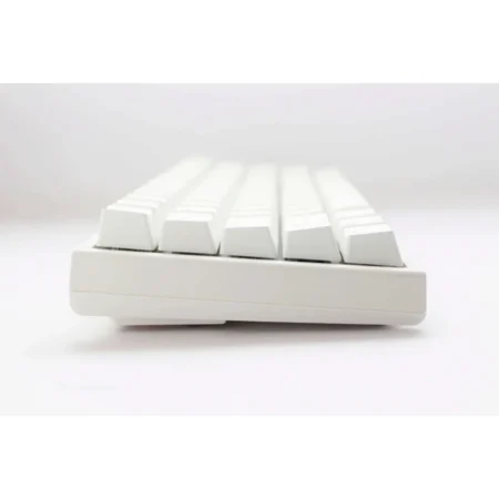 A straight-on side view of the Ducky One 2 Pro Mini White, showing the adjustable feet and pristine white case design.