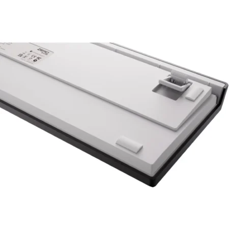 A straight-on side view showing the 3-level adjustable feet structure on the base of the keyboard.