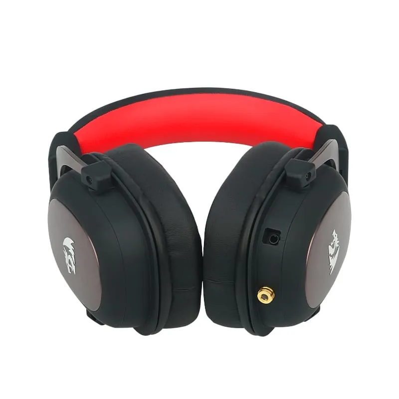 The Redragon H510 ZEUS 2 Gaming Headset lying flat and viewed from the front, showcasing both earcups in the foreground with the steel frame resting in the background.