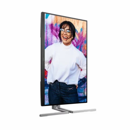 Left-angle perspective in portrait mode of the AOC U27U3XD, highlighting its elegant bezel-less design and highly adjustable stand.